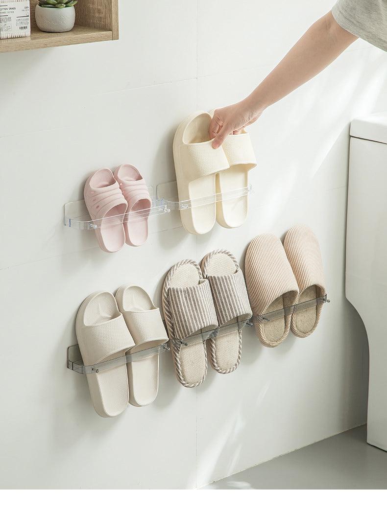 Wall-mounted shoe organizer in bathroom