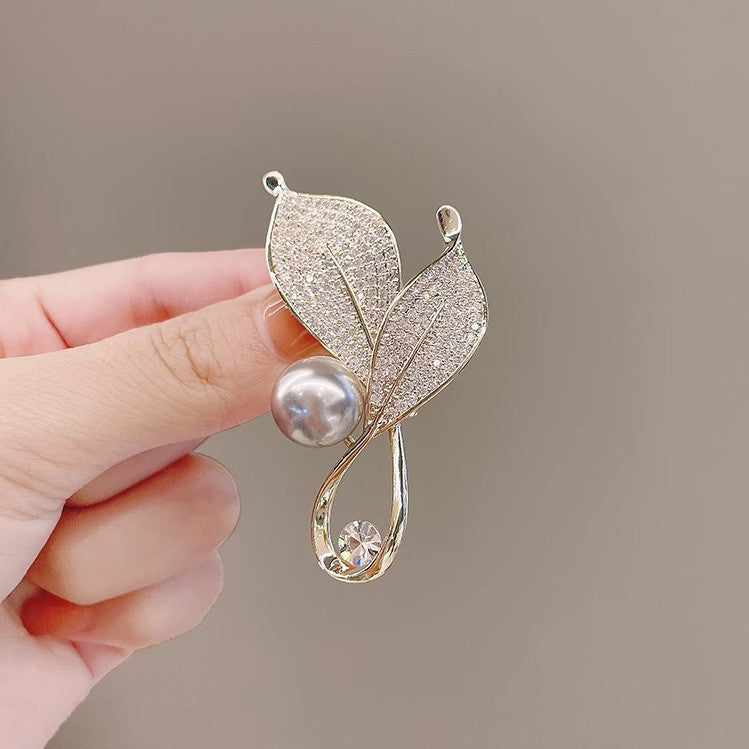 Elegant Brooch Displayed on Clothing - Image 9