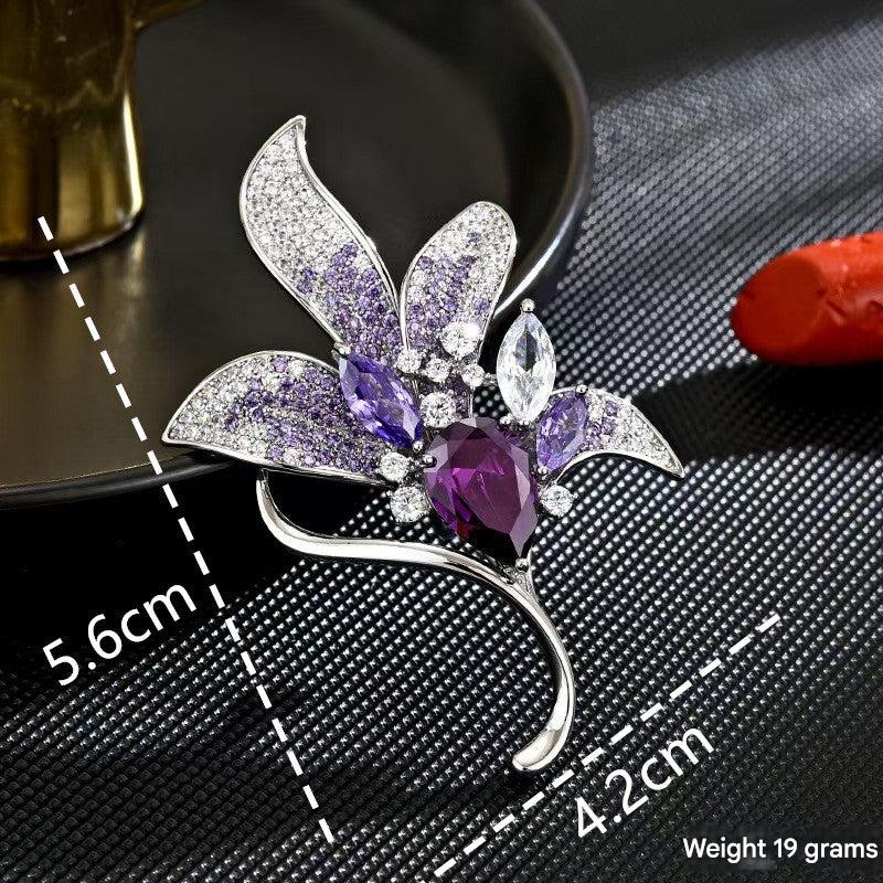 Close-up of the sparkling crystals on the floral brooch
