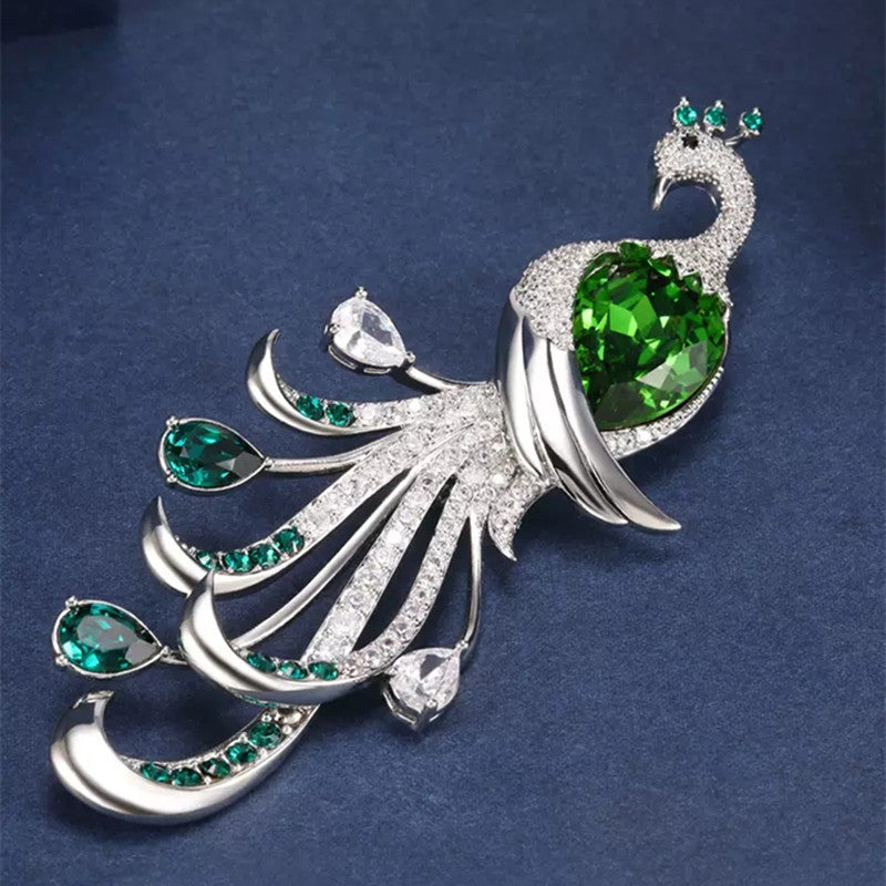 Close-up view of green peacock brooch showing detail image 3