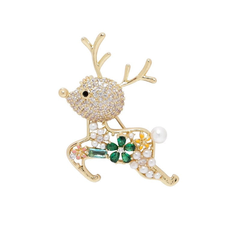 gold reindeer brooch design with hollow cutouts