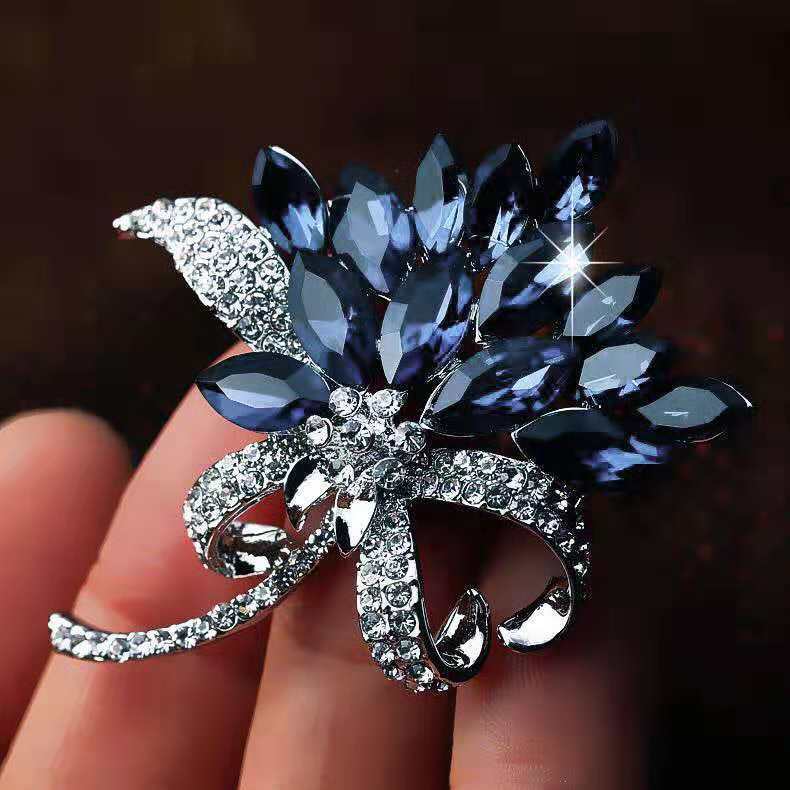flower brooch on blazer displaying elegant design