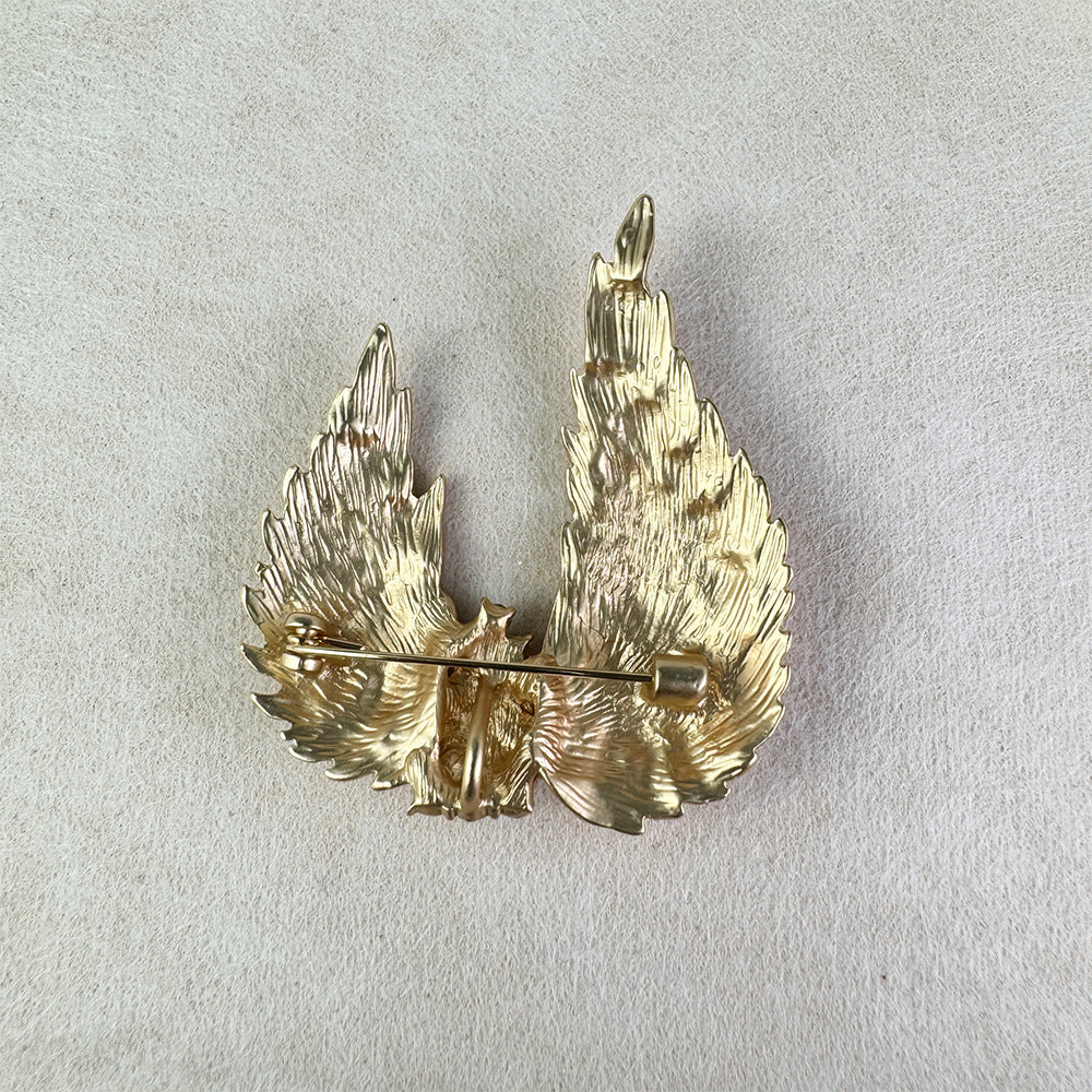 Stylish Gold-Plated Wing Brooch Closeup Image 4