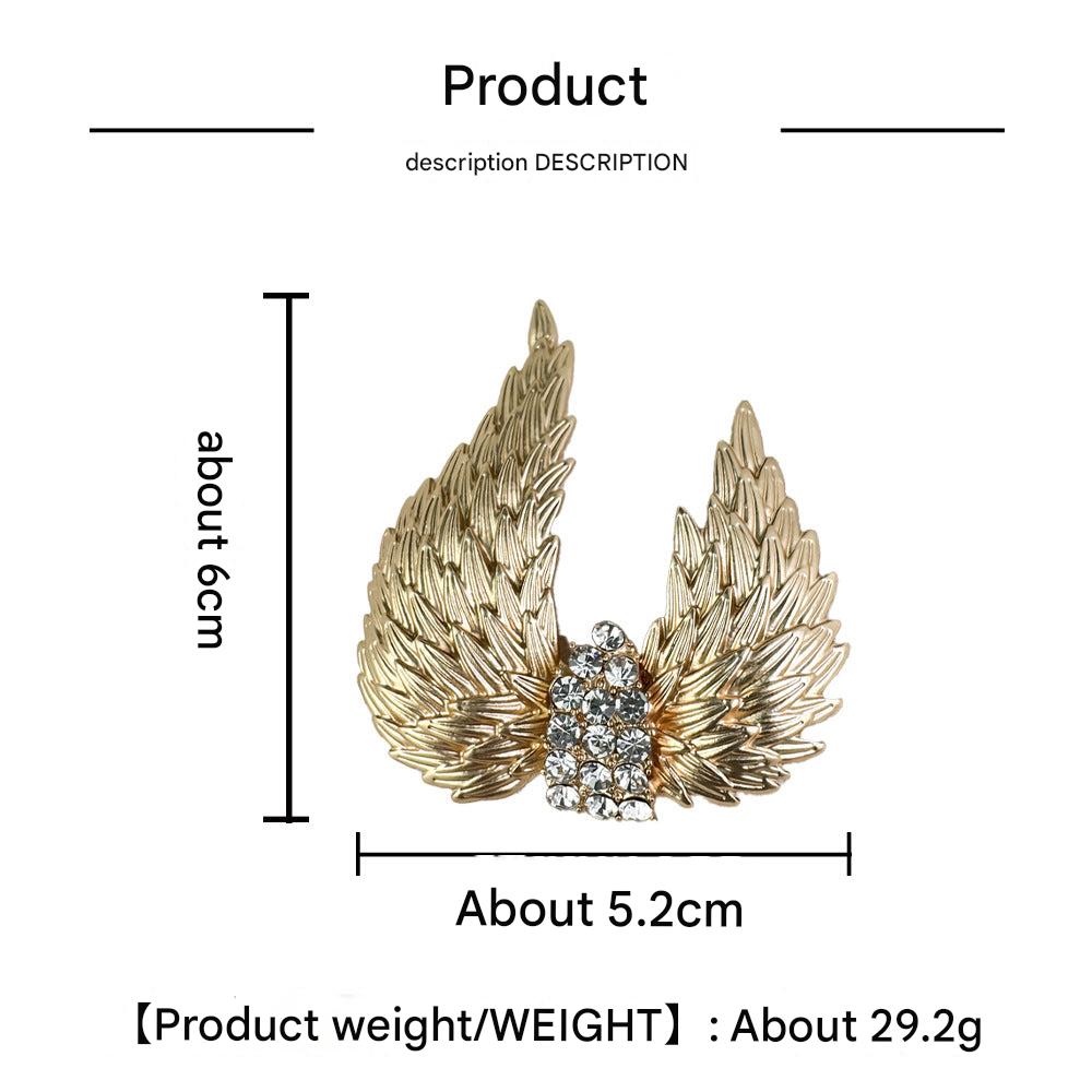 Elegant Gold Brooch Wing Design Image 2