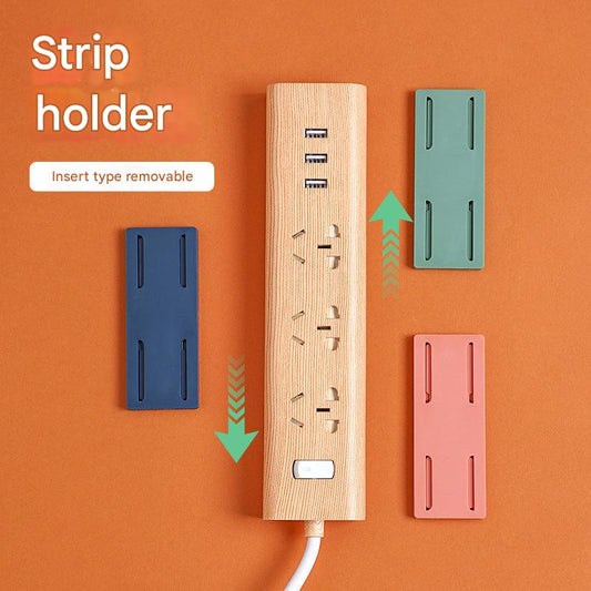 close-up of wall-mounted power strip holder