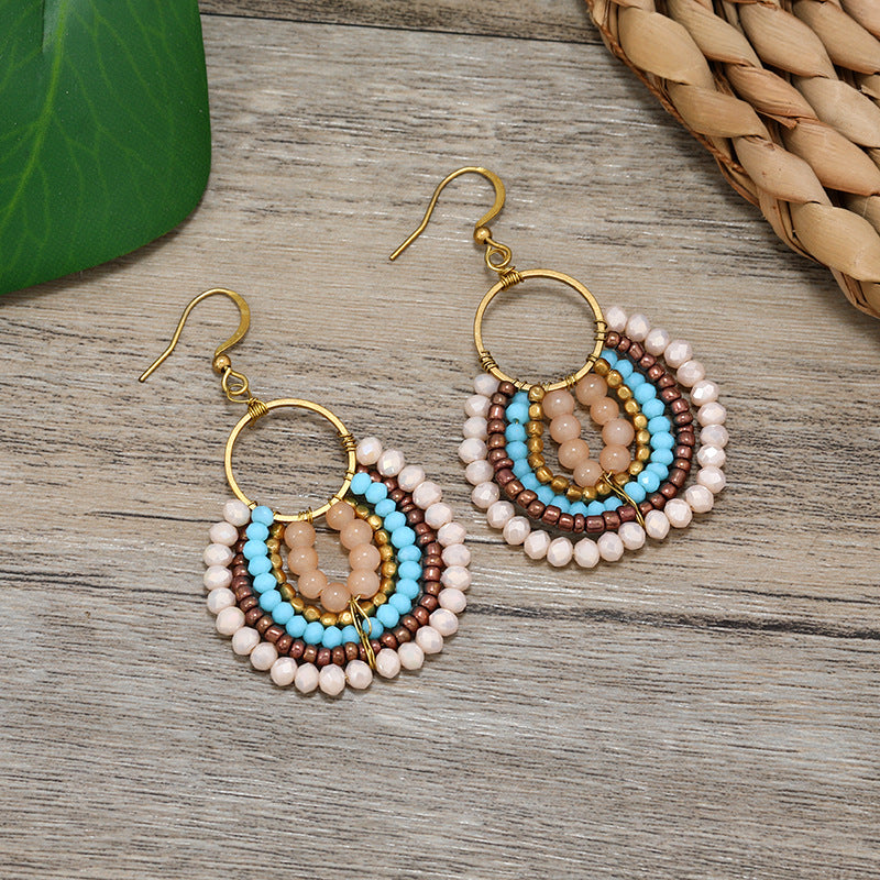Multiple styles of vintage earrings showcased