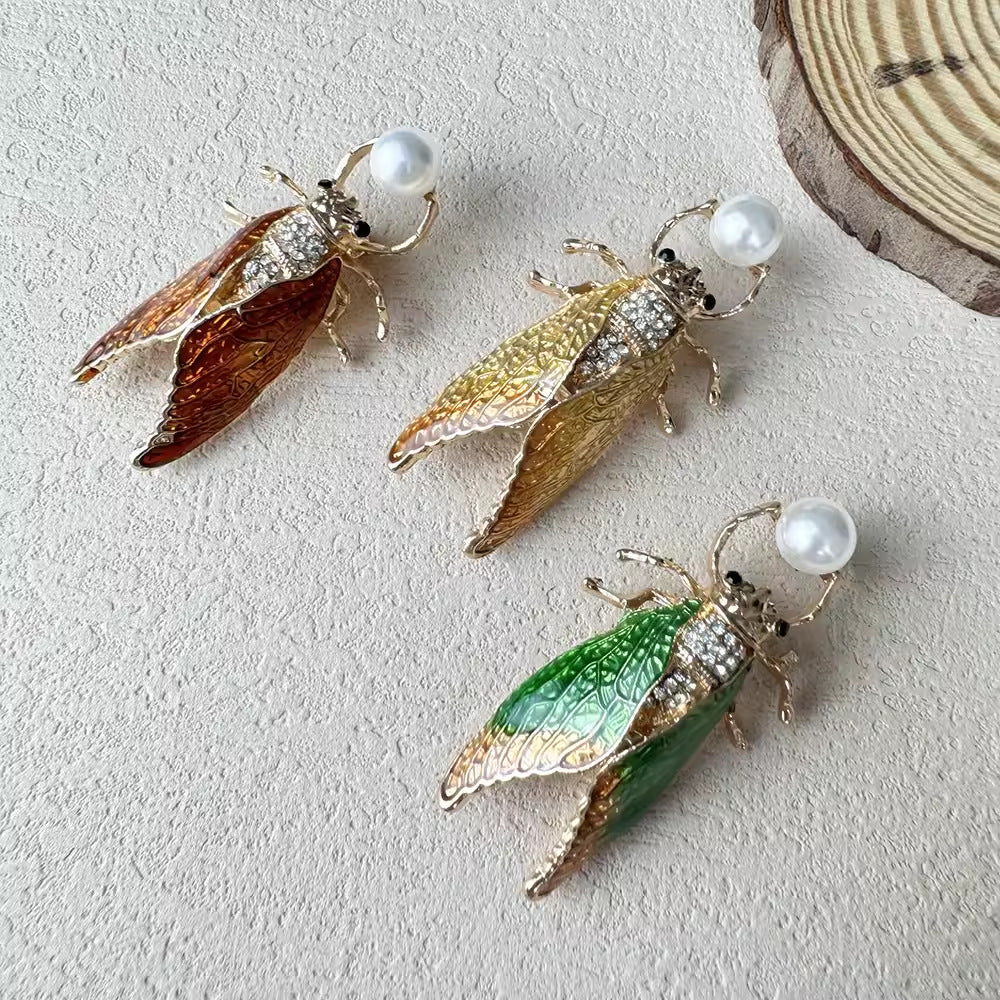 Brightly colored cicada brooch for gifting