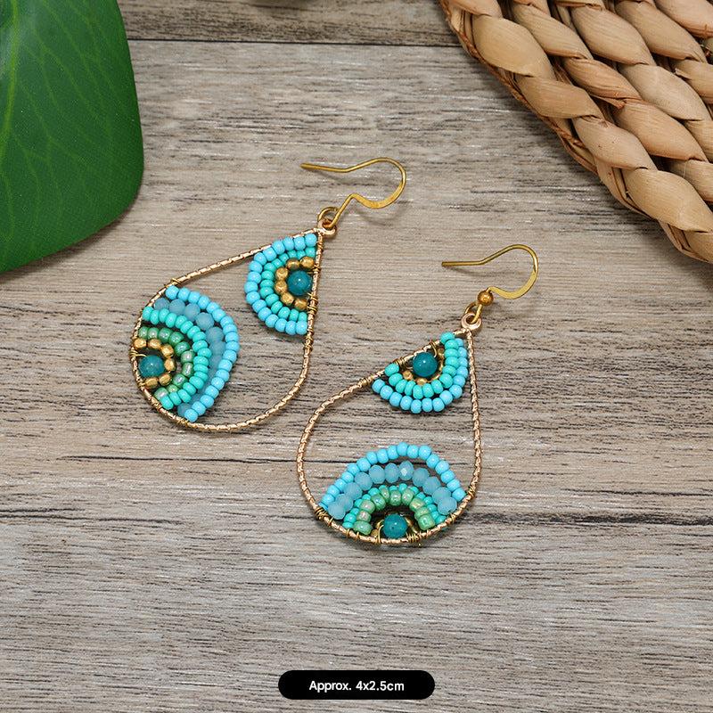 Tassel earrings close-up on the model