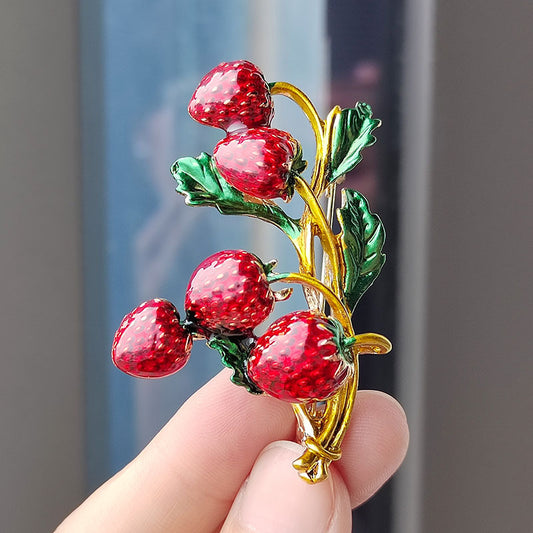 Vintage strawberry enamel pin front view