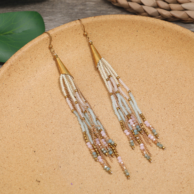 Vibrant crystal earrings close-up image 2