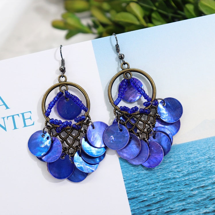 Close up of vintage shell earrings