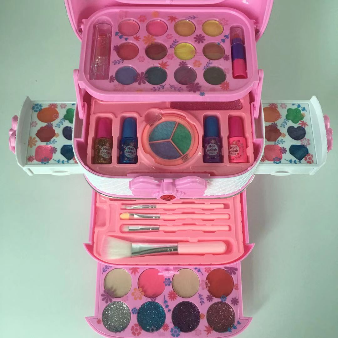 open makeup kit case with various children's cosmetics