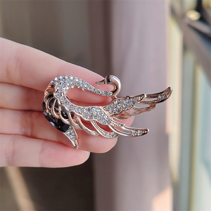 Swan brooch in various colors