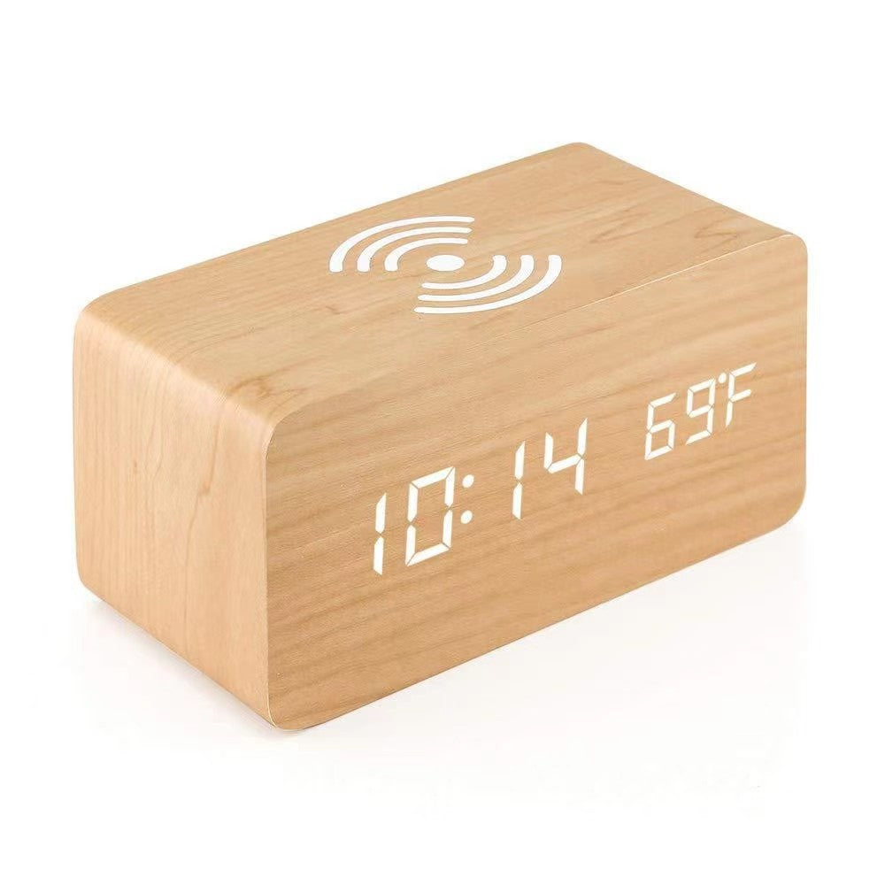 Digital clock with large LED display in dark wood