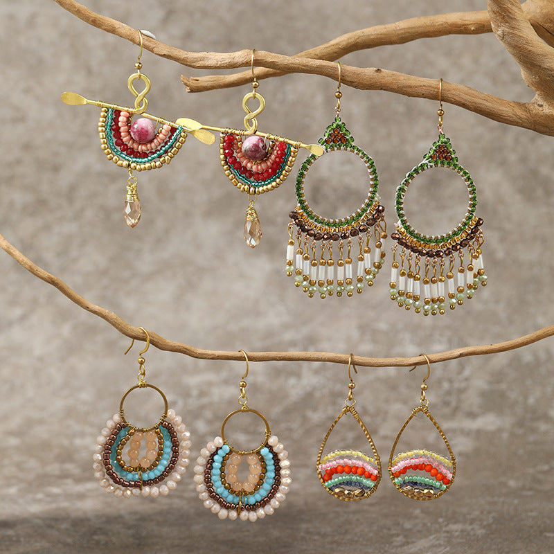 Multiple styles of vintage earrings showcased