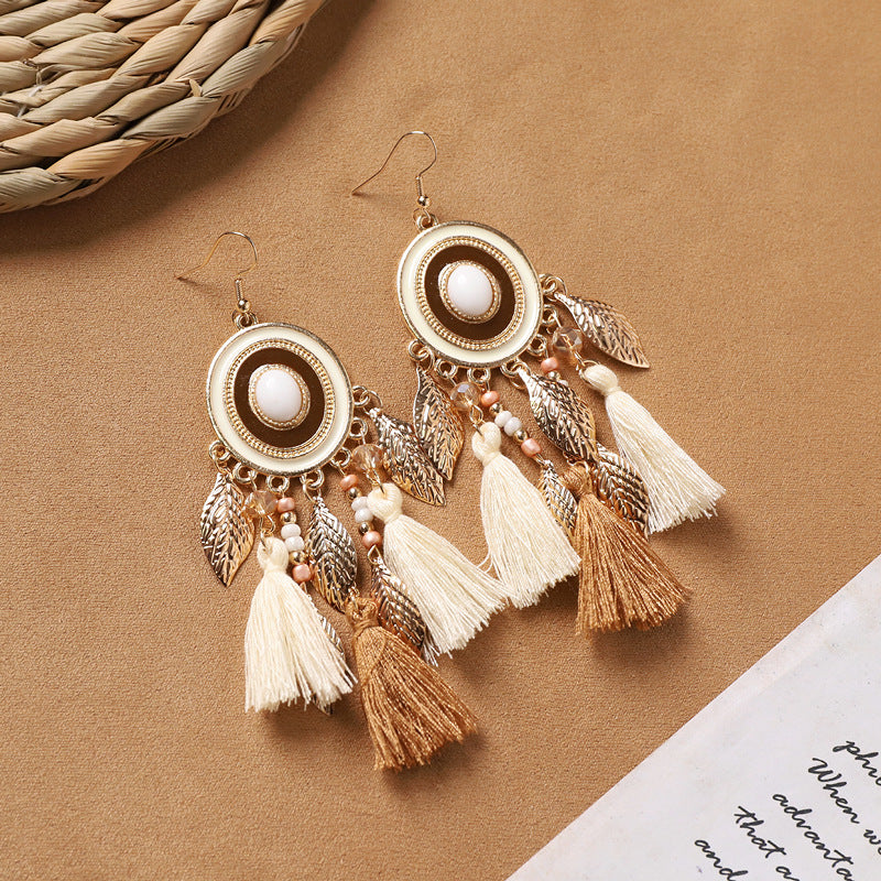 Handcrafted jewelry with feather details