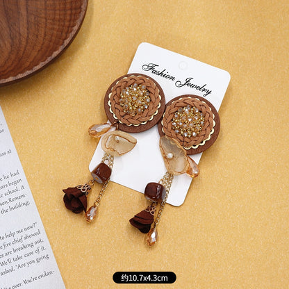 Long drop vintage tassel earrings close-up image 2