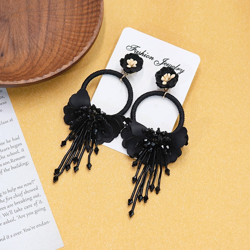 Long drop vintage tassel earrings close-up image 2