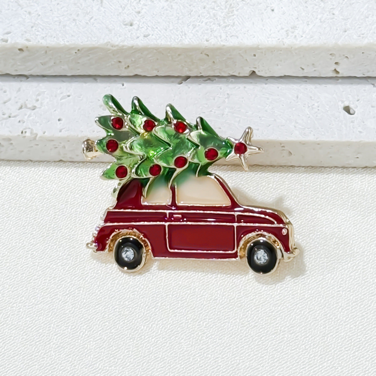 Beautifully designed Christmas Brooch with car and tree