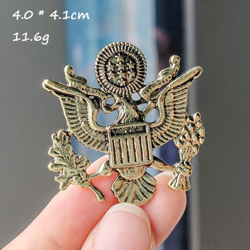 Baroque crown shield brooch front view