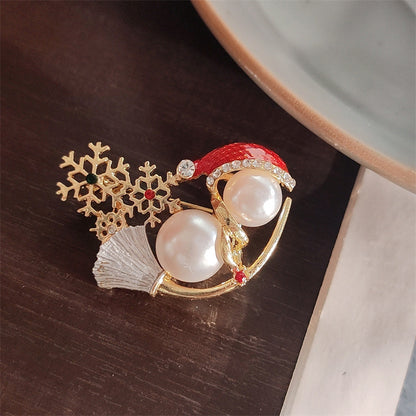 Elegant snowman brooch pearl design