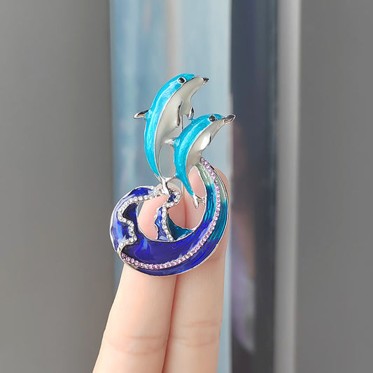 Stylish dolphin brooch design on jacket