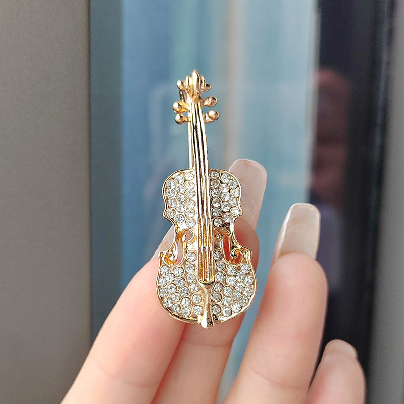 Silver oil drop violin brooch showcasing sparkling rhinestones - image 3