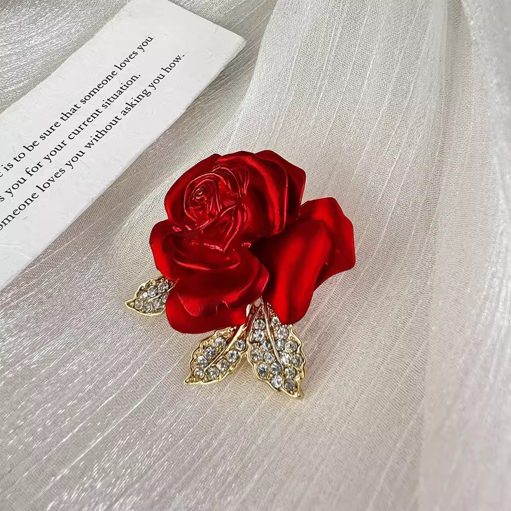 elegant rose flower pin displayed on table image 6
