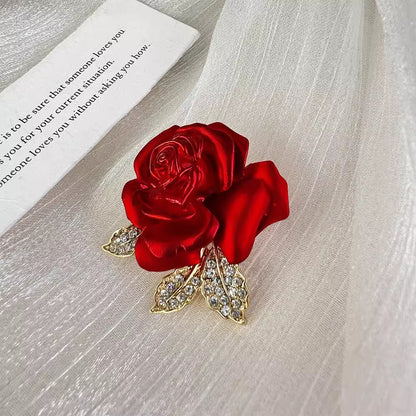 elegant rose flower pin displayed on table image 6