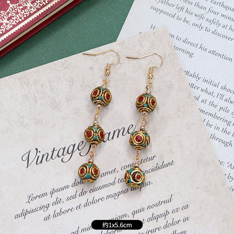 Artistic vintage earrings close-up 3
