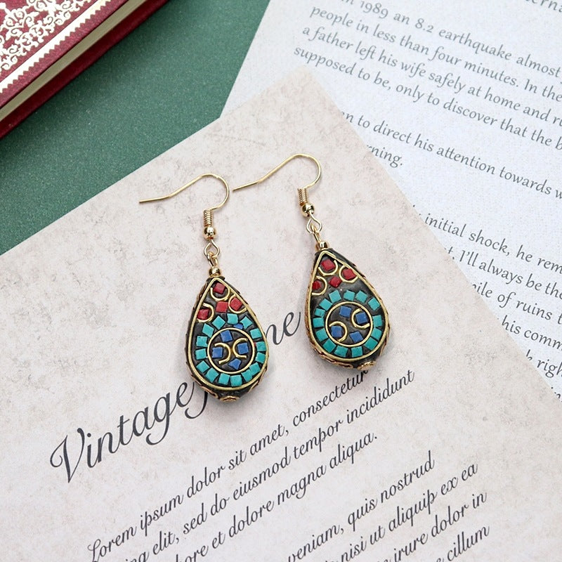 Artistic vintage earrings close-up 3
