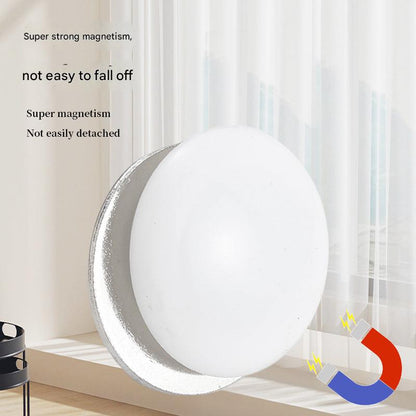 Magnetic curtain weight hanging on curtain