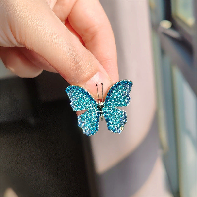 Butterfly Brooch side view showing rhinestone details