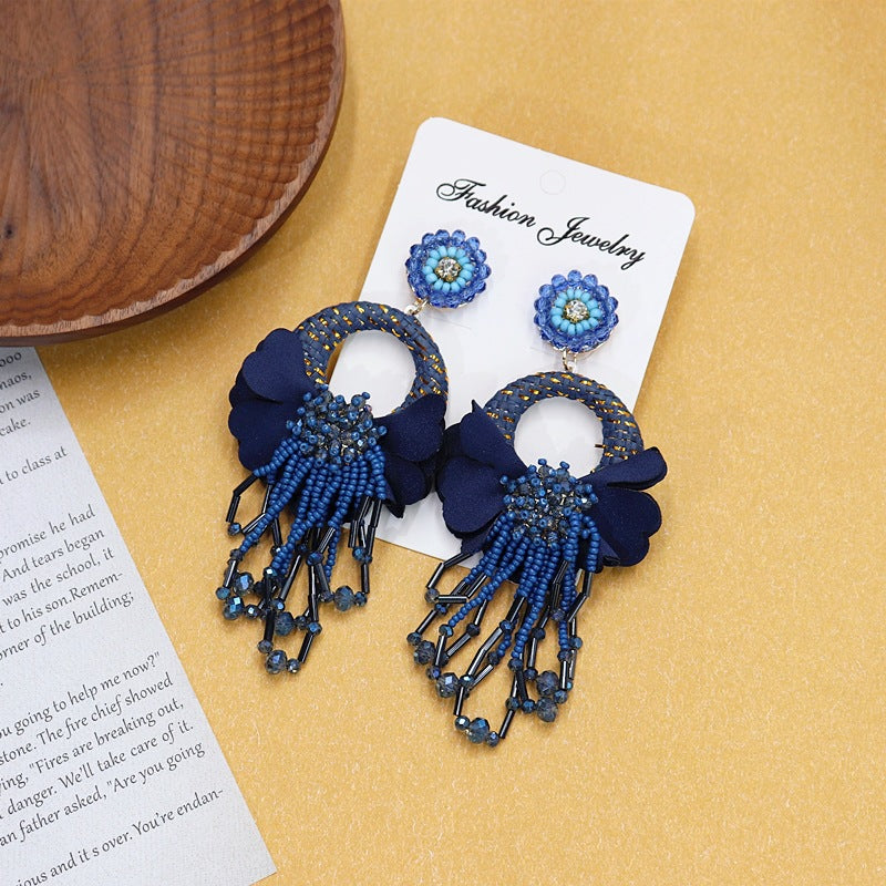 Group shot of different color earrings image 10