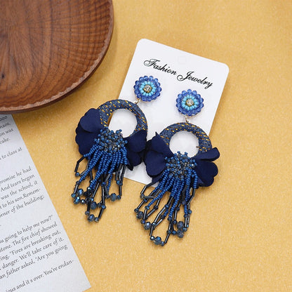 Group shot of different color earrings image 10