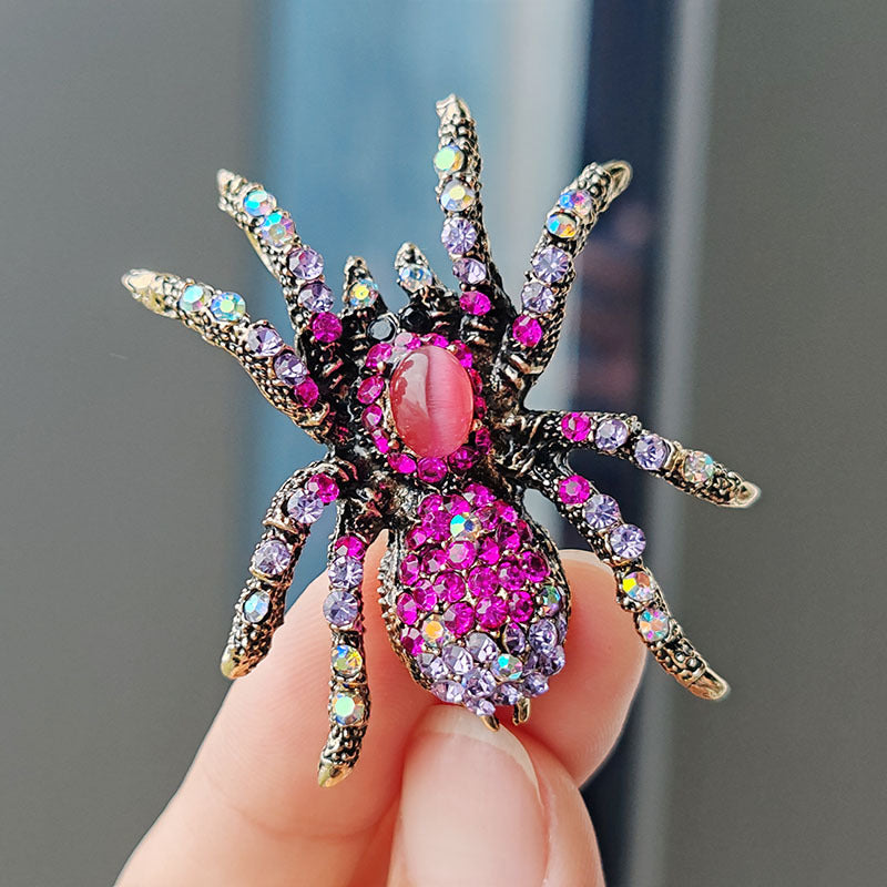 Alloy spider brooch in rose red color