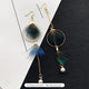 8 - Irregular Pearl Tail Feather
