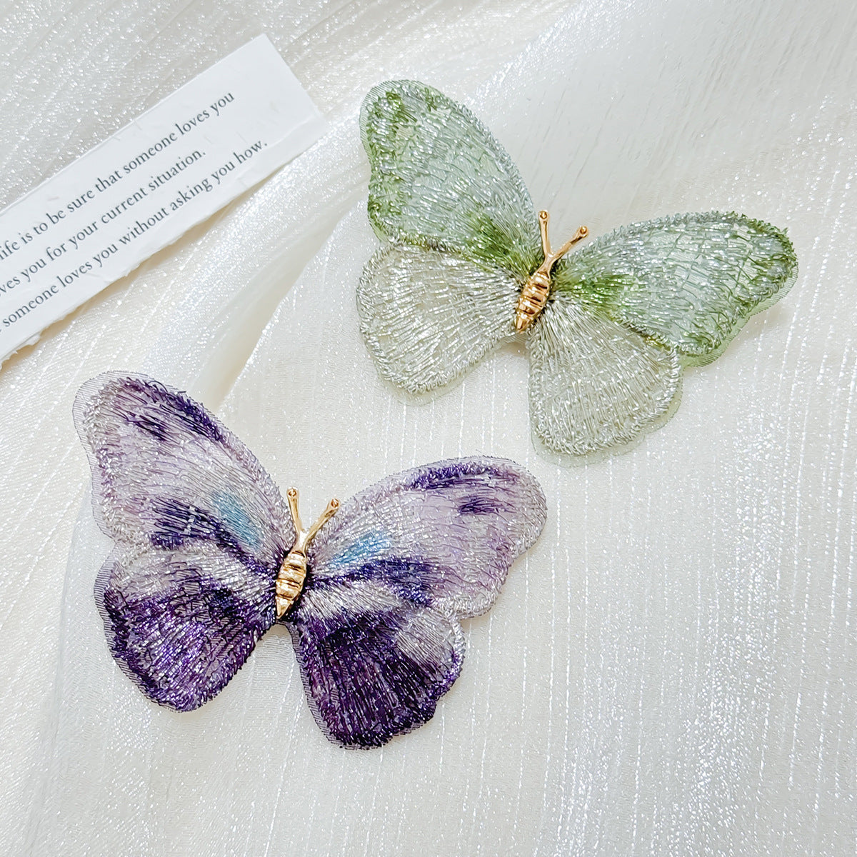 Colorful butterfly brooch on display