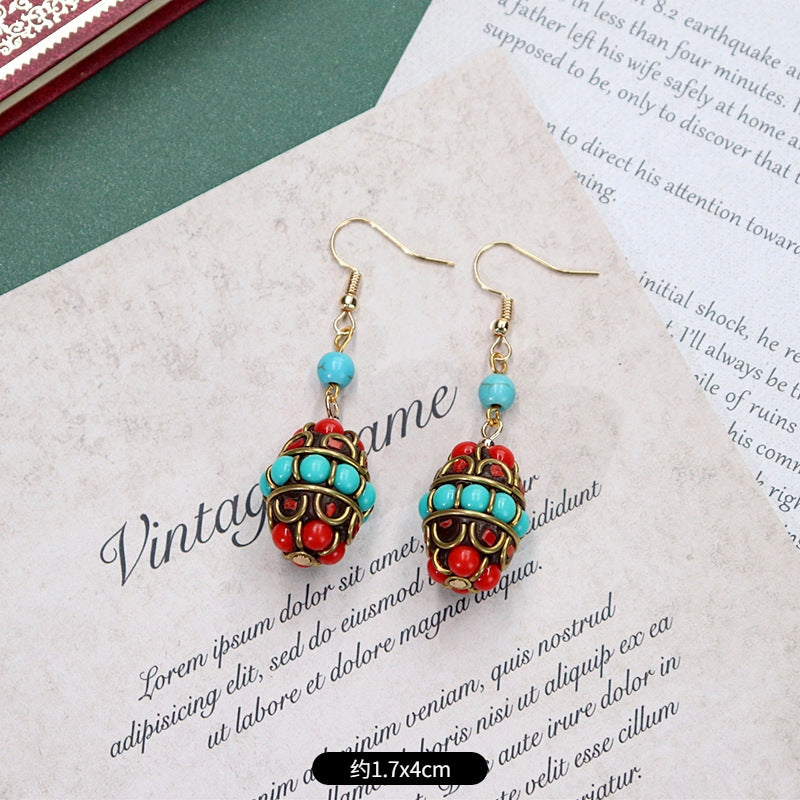 Artistic vintage earrings close-up 3