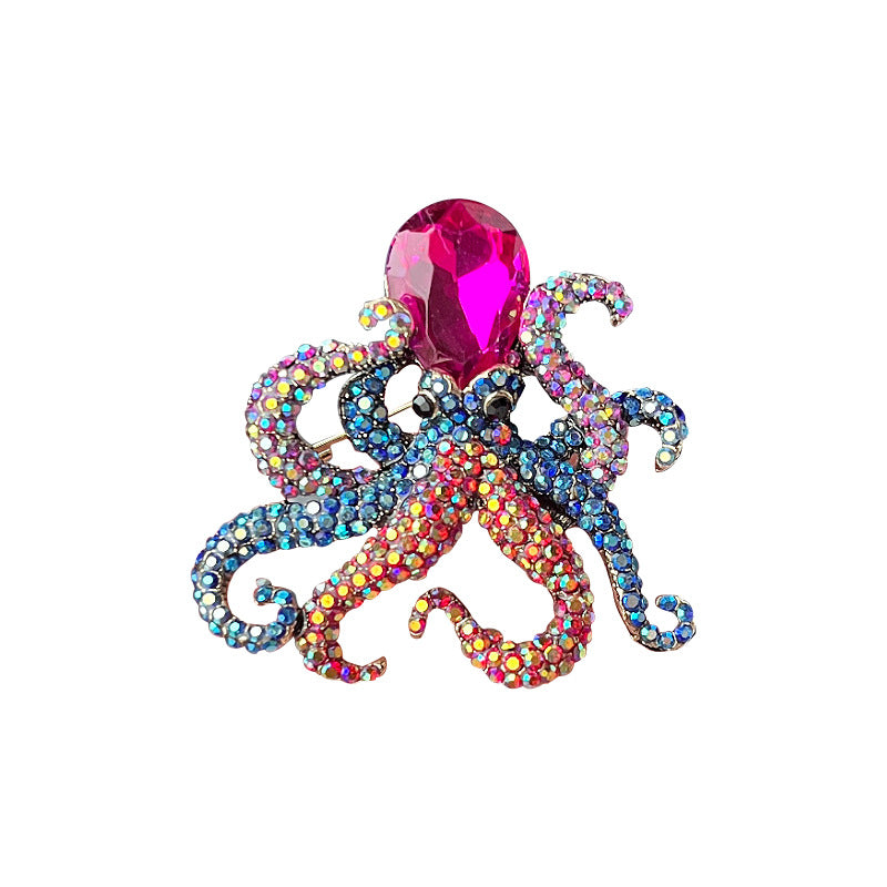 Fashion accessory octopus brooch on fabric