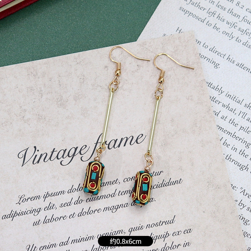 Artistic vintage earrings close-up 3