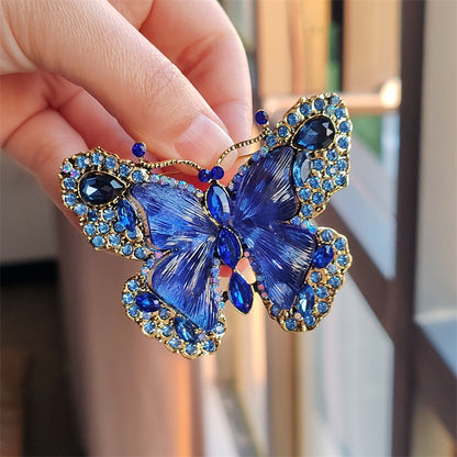 Elegant butterfly brooch in green design