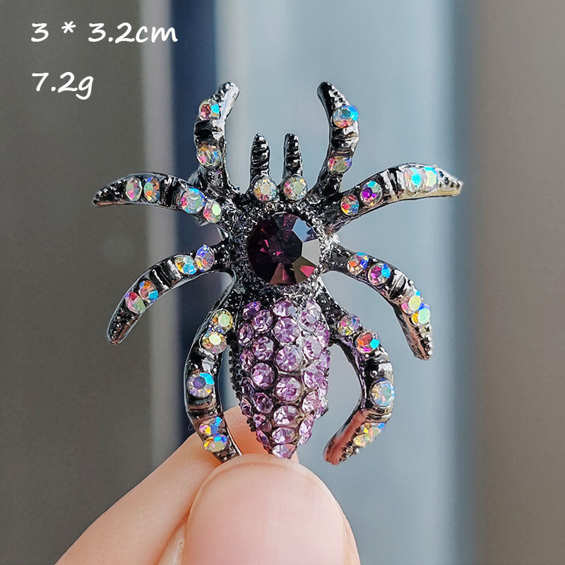 Alloy spider brooch in rose red color