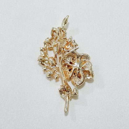 Close-up of floral brooch details