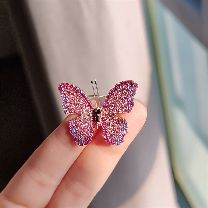 Close-up of the butterfly design on the brooch