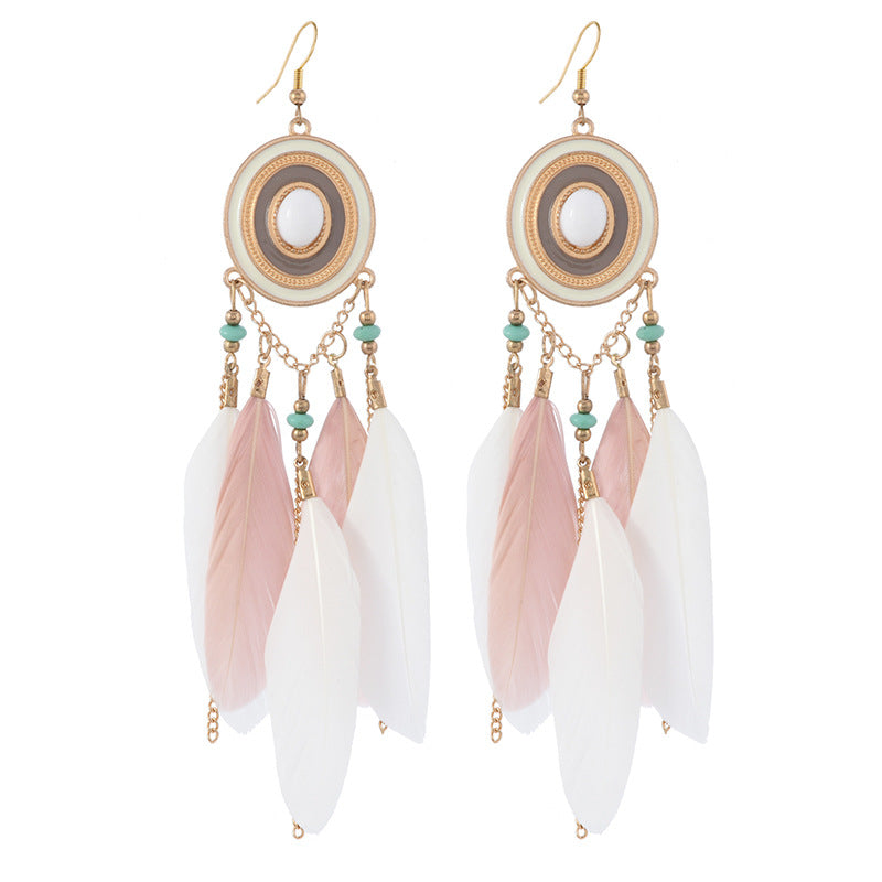 Different style variations of feather earrings