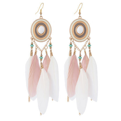 Different style variations of feather earrings
