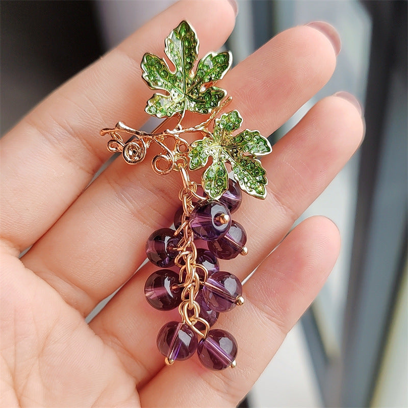 Colorful brooch with sparkling details