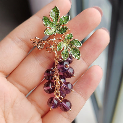 Colorful brooch with sparkling details