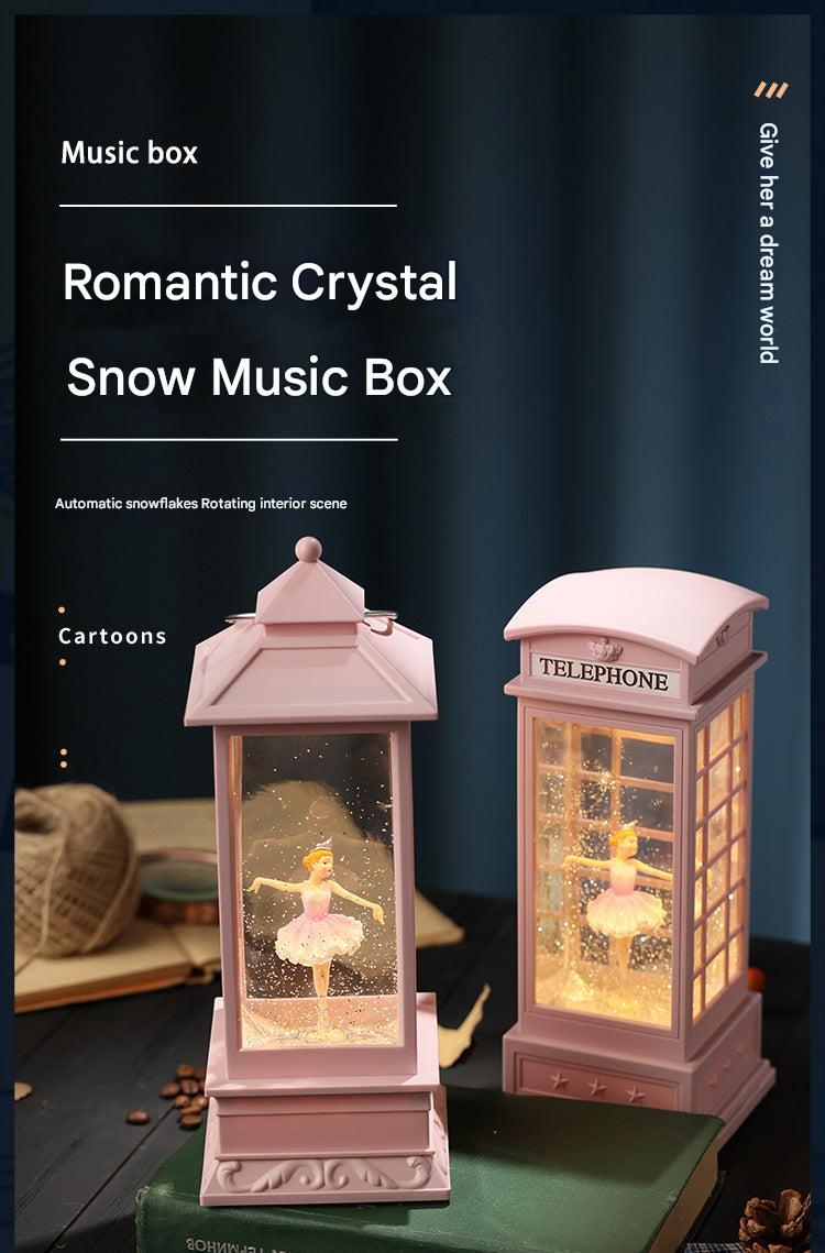Ballet dancer inside clear snow globe rotating image 1